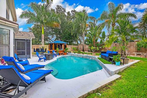 Urban Oasis withHot Tub, HEATED POOL and Private Movie Theater home in Melbourne, USA
