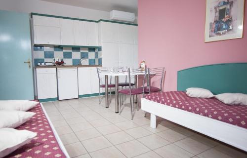 Theoni Apartments - main image