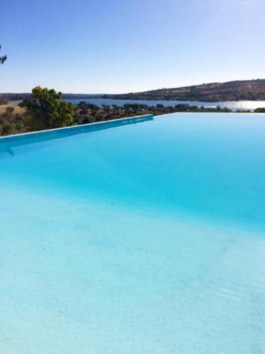 . One bedroom property with lake view shared pool and furnished garden at Montargil