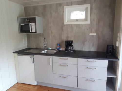 廚房, 倫德旅客車站酒店 (Lunde Turiststasjon) in 史凱伊約斯泰爾