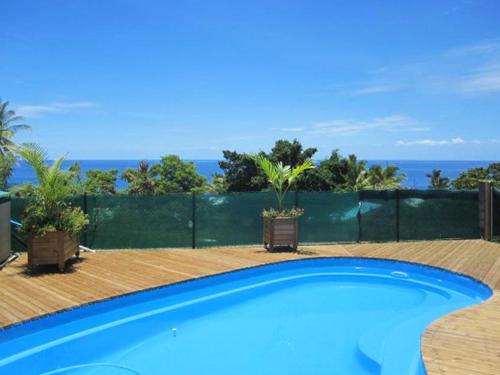 Studio a Saint Leu a 500 m de la plage avec vue sur la mer piscine partagee et jardin clos - Location saisonnière - Saint-Leu