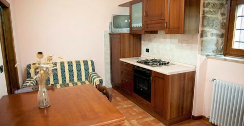 One bedroom appartement with shared pool enclosed garden and wifi at Caprese Michelangelo