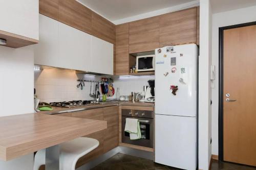 virtuve, Appartamento Gassman - Holiday Apartment in Milano in Quartiere Adriano