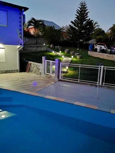 Appartement de 2 chambres avec piscine partagee jacuzzi et jardin clos a Lamentin