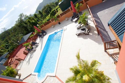 Vaade, Appartement charmant à Deshaies avec piscine partagée, 46 m². (Appartement charmant a Deshaies avec piscine partagee, 46 m².) in Deshaies