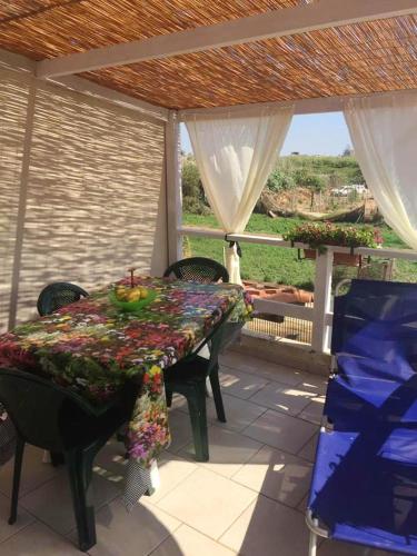 . Seafront Apartment in Scoglitti with Enclosed Garden