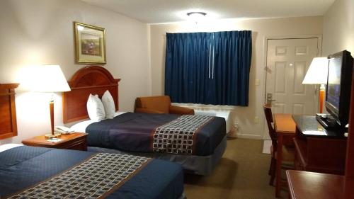 Carom Inn a Travelodge by Wyndham Denham Springs-Baton Rouge