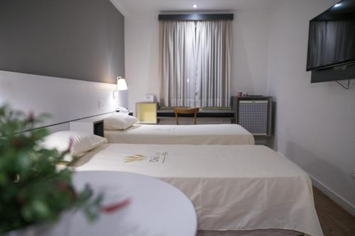 Uniclass Hotel Pinheiros Set in a prime location of Sao Paulo, Uniclass Hotel Pinheiros puts everything the city has to offer just outside your doorstep. The hotel offers guests a range of services and amenities designed to p