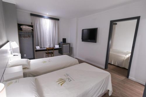 Uniclass Hotel Pinheiros Set in a prime location of Sao Paulo, Uniclass Hotel Pinheiros puts everything the city has to offer just outside your doorstep. The hotel offers guests a range of services and amenities designed to p