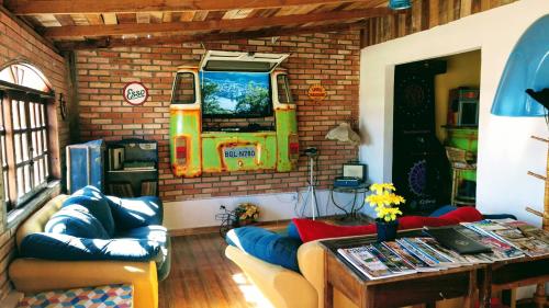 ห้องส่วนกลางสำหรับนั่งเล่น/ดูทีวี, SPACE 4 U - HOTEL BOUTIQUE TEMÁTICO - Aeroporto (SPACE 4 U - HOTEL BOUTIQUE TEMATICO - Aeroporto) in ซาโอ โจเซ่ ดอส ปินแอส์