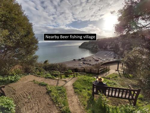 Our beautiful large Suite room with a Double bath with Shower ensuite - It has a full Kitchen boasting stunning views over the Axe Valley - Only 3 miles from Lyme Regis, River Cottage HQ & Charmouth - Comes with free private parking