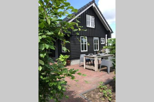 B&B Hollandsche Rading - Uniek houten huis nabij bos en plassen - Bed and Breakfast Hollandsche Rading