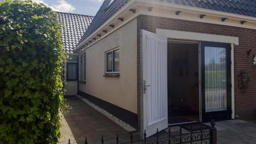  2 persoons appartement Le Garage, Pension in Frieschepalen bei Opende-West