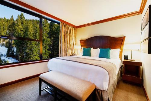 Suite with Fireplace and Forest View