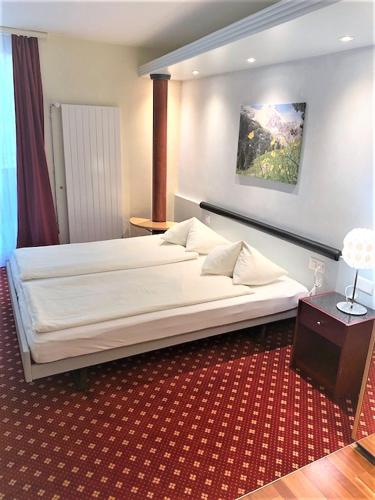 Standard double room north (no river view) with balcony (Room 111)