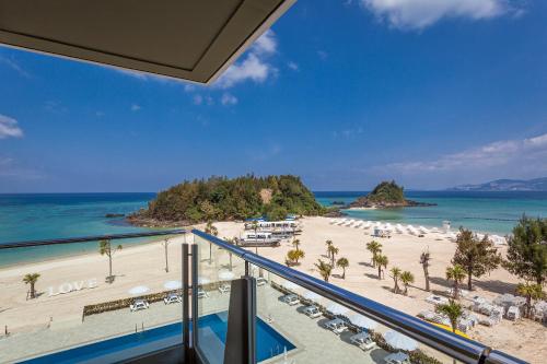 Balcony/terrace, OKINAWA KARIYUSHI LCH.RESORT on The Beach in Nago