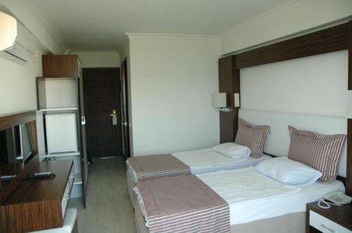 Arora Hotel Set in a prime location of Kusadasi, Arora Hotel puts everything the city has to offer just outside your doorstep. Both business travelers and tourists can enjoy the hotels facilities and services. A