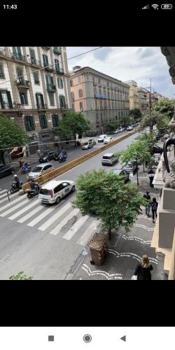 a city street filled with lots of traffic, la dimora guesthouse Re Ferdinando in Naples