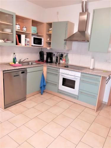 köök, Gästehaus Atrico Haus 4 (Gastehaus Atrico Haus 4) in Hopsten