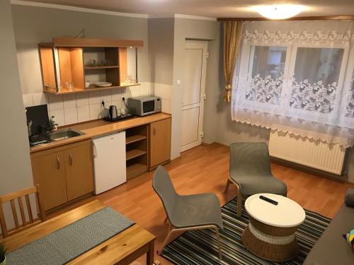 Apartamenty pod Modrzewiem Apartamenty pod Modrzewiem