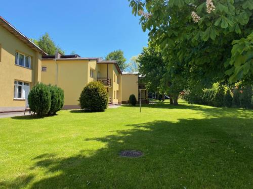 Apartamenty pod Modrzewiem Apartamenty pod Modrzewiem