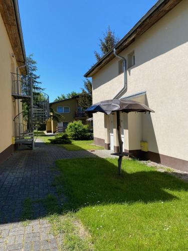 Apartamenty pod Modrzewiem Apartamenty pod Modrzewiem