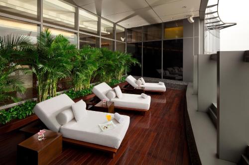 Shared lounge/TV area, Altira Macau in Taipa