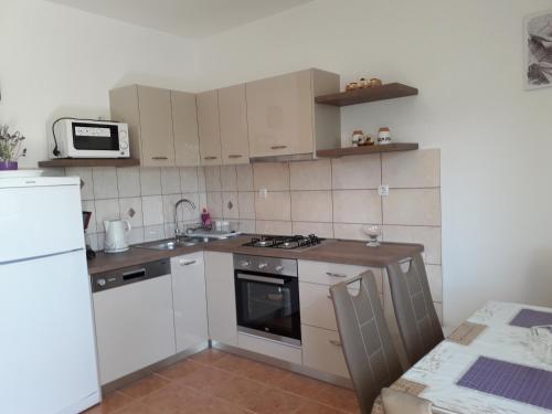 Apartmani Roza Lopar