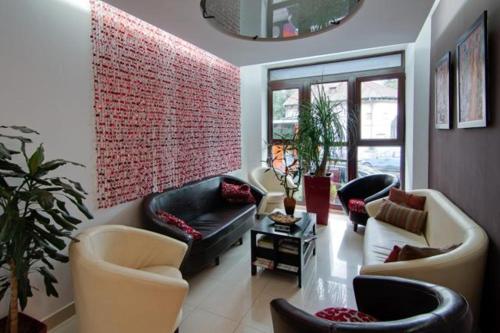 zonă comună salon/TV, Hotel Razvan in Bucureşti