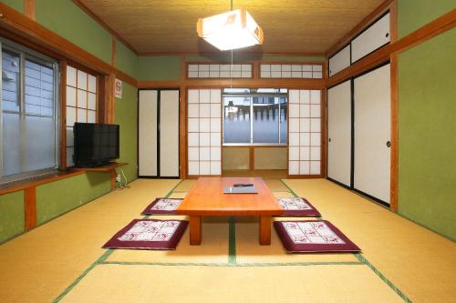 Japanese-Style Family Room with Shared Bathroom