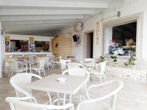 Bar/lounge, Villaggio Camping Oasi in Spiaggia Scialmarino