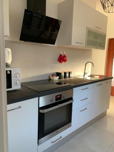 virtuve, Apartments & Room Piutti in Bale