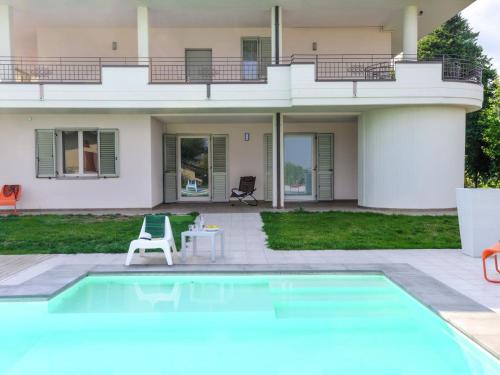 Swimming pool, Beautiful Apartment with Pool on an Estate in Tavullia in Belvedere Fogliense