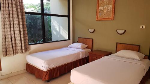 Troppo Zone Puri Rama Resort Kuta Room Type - Superior Twin Room