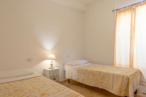 Li Tamarici – Cannigione, NJ