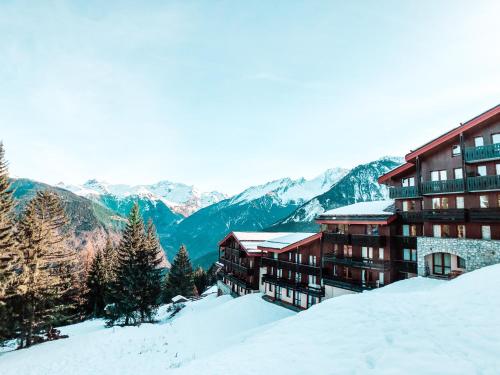 Appartement Le Charmantin Courchevel Village skis aux pieds