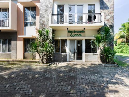 Entrance, RedDoorz Syariah Plus @ Wisma Bougenville Karawaci in Karawaci