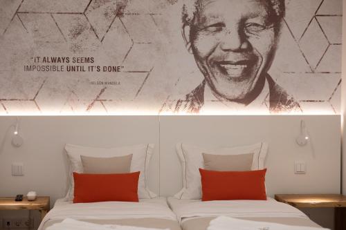 The ICONS Lisbon Hotel Room Type - Deluxe Triple Room
