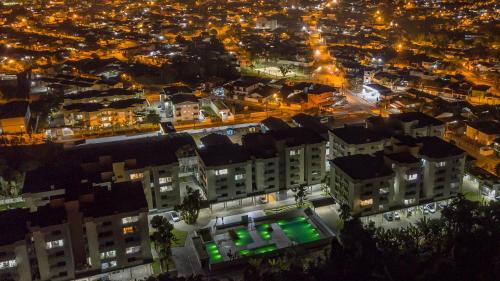 Apartamento Ubatuba AR Varanda Gourmet Piscinas e 300mt Praia - image 3