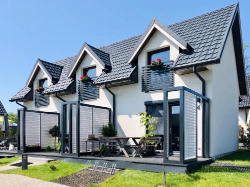 Domki Apartamenty Akacja - Location saisonnière - Sianożęty