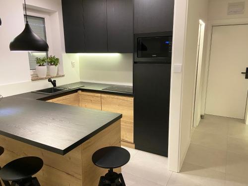 Deluxe One-Bedroom Apartment with Balcony and Sea View