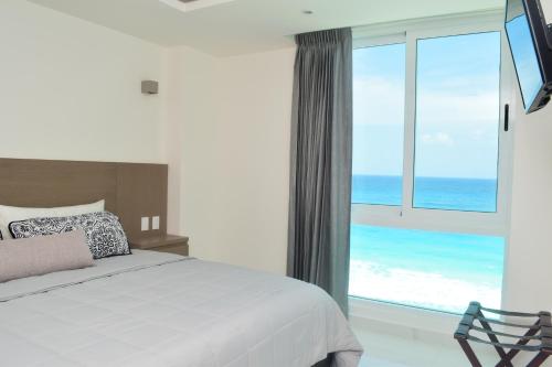 Nuevo estudio a pie de playa, vistas increibles, alberca, gym jacuzi, seguridad, 3503, Cancún (foto 2)