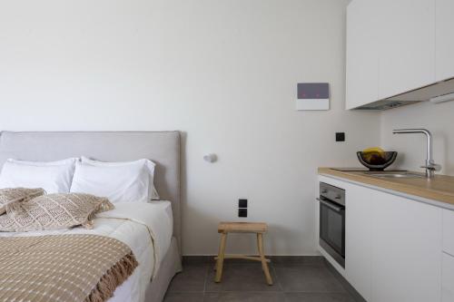 Boho Living apartments with shared pool next the beach - main image