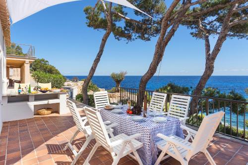  Front Line Sea Villa In Mallorca Up to 6 Guests in Font de Sa Cala