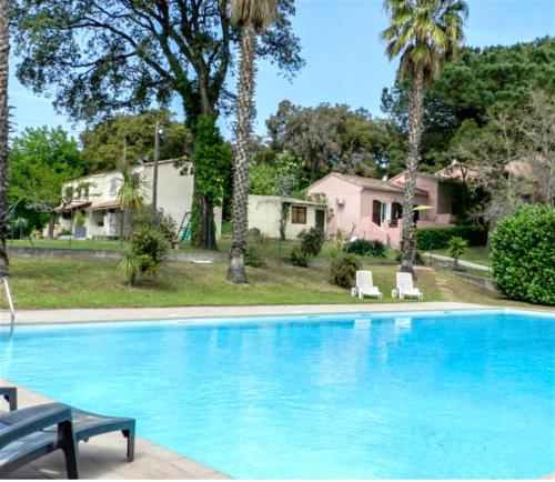 Maison de 2 chambres avec piscine partagee jardin amenage et wifi a San Nicolao a 1 km de la plage