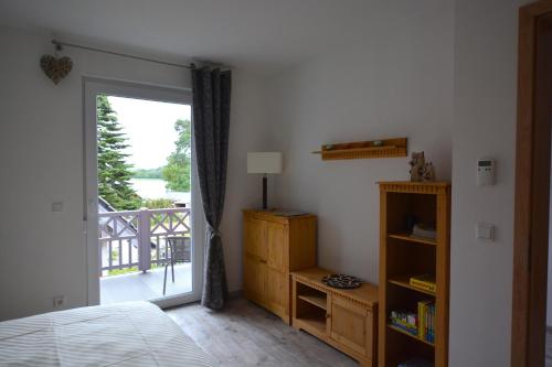 Erkély/terasz, Urlaub am Plätlinsee - Haus Odin (Urlaub am Platlinsee - Haus Odin) in Wustrow