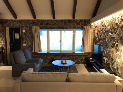 タイペイ Jiufen Gourd Stone TreeHouse 137 4つ星 ゲストハウス スイート