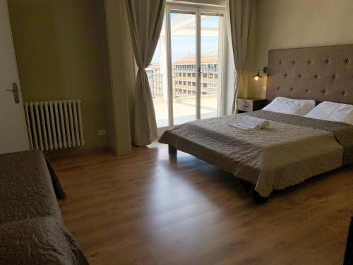 L'Attico di Piazza Mazzini Rooms - image 2