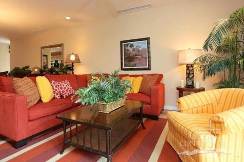 Luxe! Impressively designed 2nd-floor unit in Coco done in red and orange hues