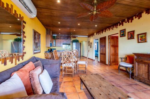 Warm Interiors and Orange Hues on Ground Floor in Front of Beach